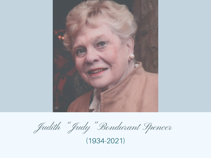 Photo of Judith “Judy” Bondurant Spencer on light blue background